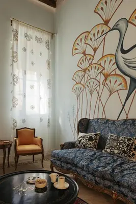a living room with a couch and a table at Beit Felfel in Esna