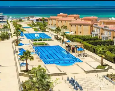 an aerial view of the pool at the resort at Amazing 1 bedroom & sofa bed at Selenabay Hurghada in Hurghada