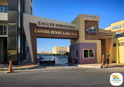 a building with a sign that reads eagles downtown zaria resort andala park at Tiba Golden in Hurghada