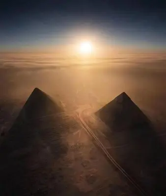 a view of the top of a pyramid with the sunset at VESTA - El Gouna Residence in Hurghada