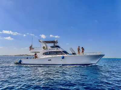 a group of people on a boat in the water at TaiTours in Hurghada