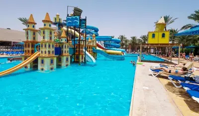 a water park in a resort with people in the water at قرية ميراج باي للراحة والانسجام in Hurghada