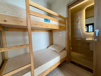 a bunk bed in a bathroom with a shower at Premium 3BR Plus Nanny Villa -Free Pool And Lagoon Access In ElGouna in Hurghada