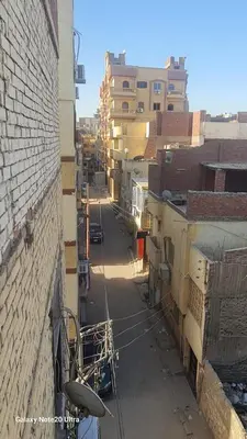 a view of an alley between two buildings at Aladino Nubian Soul in Aswan
