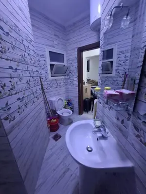 a bathroom with a sink and a toilet in it at Casblanka beach in Hurghada