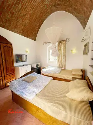a bedroom with two beds in a room at Studio For Rent in El Gouna Kafr in Hurghada