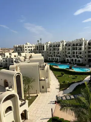 arial view of a large building with a resort at Appartement hurghada gravity beach in Hurghada