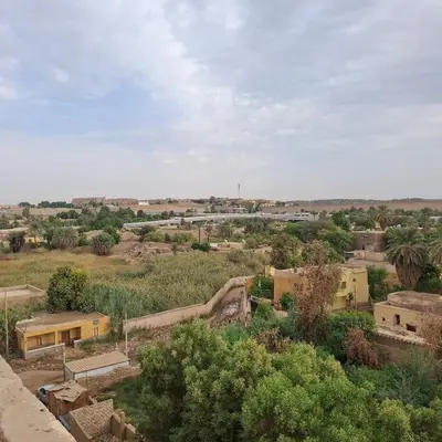 a small village in the middle of a field at Julia's Guest House in Shellal