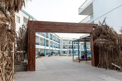an entrance to a building with a wooden gate at Mirage Bay Resort Hurghada B-794 in Hurghada