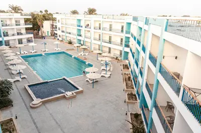 an overhead view of the pool at a hotel at Mirage Bay Resort Hurghada B-794 in Hurghada