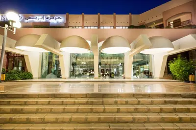 a mall with stairs in front of a building at Pyramisa Island Hotel Aswan in Aswan
