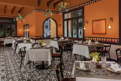 a dining room filled with tables and chairs at JAZ Makadi Star & Spa in Hurghada
