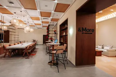 a restaurant with tables and chairs in a room at Sheraton Soma Bay Resort in Hurghada