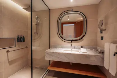 a bathroom with a sink and a shower at Sheraton Soma Bay Resort in Hurghada