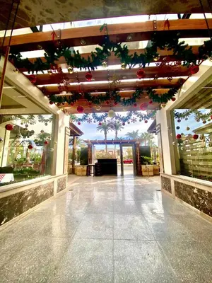a lobby with christmas decorations in a mall at Elaria Hotel Hurgada in Hurghada