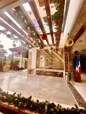a lobby with a basketball court and christmas decorations at Elaria Hotel Hurgada in Hurghada