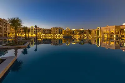 a view of a large pool of water with buildings at Pickalbatros White Beach Resort - Hurghada in Hurghada