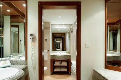 a bathroom with two sinks and a large mirror at Hurghada Marriott Beach Resort in Hurghada
