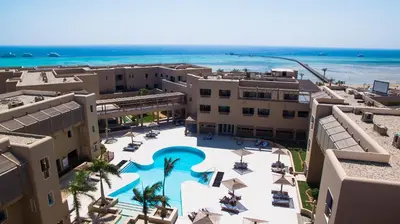an aerial view of a resort with a swimming pool at The Breakers Diving and Surfing Lodge Soma Bay in Hurghada