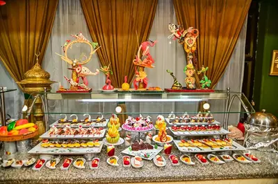 a buffet with many different types of food on a table at Eagles Paradise Abu Soma Resort in Hurghada