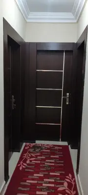 a room with a closet with a red rug at Hurghada Big private villa for families in Hurghada