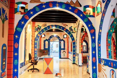 an archway in a building with colorful tiles at Nuba Narty in Aswan