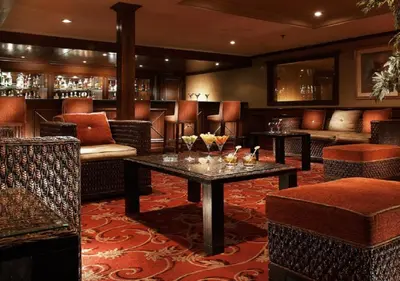 a lobby with a bar with tables and chairs at JAZ Crown Jubilee Nile Cruise - Every Thursday from Luxor for 07 & 04 Nights - Every MondayFrom Aswan for 03 Nights in Luxor