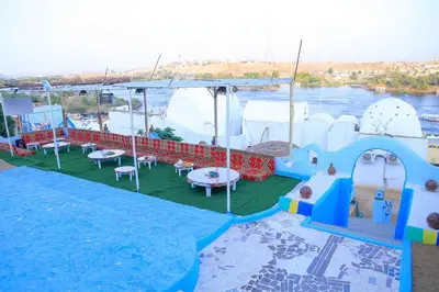a view of a water park with a water slide at Nubian Palace Eco Lodge - A Nubian Home Since 1959 in Aswan