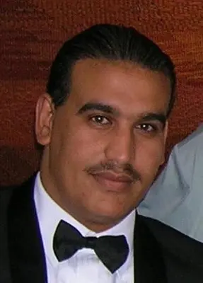 a man wearing a tuxedo and a bow tie at Gold Ibis Hotel in Luxor