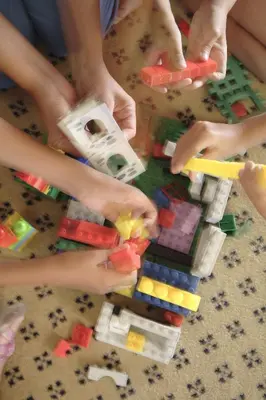 a group of children playing with legos at Hurghada Suites & Apartments Serviced by Marriott in Hurghada