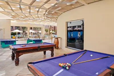 a pool room with a pool table and pool balls at Pickalbatros Aqua Vista Resort - Hurghada in Hurghada
