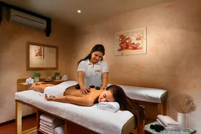 a woman getting a massage in a massage room at Pickalbatros Aqua Vista Resort - Hurghada in Hurghada