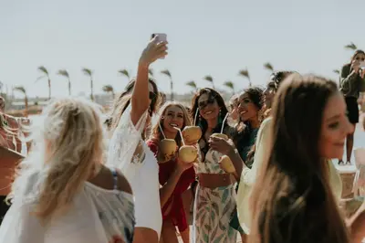 a group of young women standing on the beach at Meraki Resort - Adults Only in Hurghada