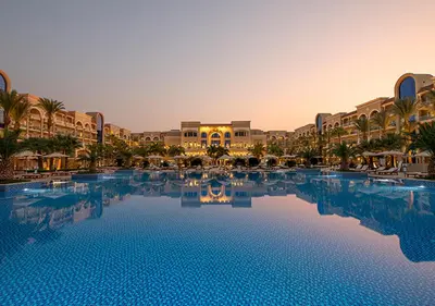 a large swimming pool in front of a resort at Premier Le Reve Hotel & Spa Sahl Hasheesh - Adults Only 16 Years Plus in Hurghada