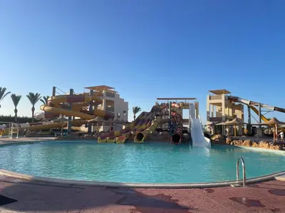 a water park with a water slide and slides at Comfortable studio in hotel Karma with private beach and pools family only or female in Hurghada