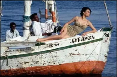 a man and a woman sitting on a boat at felouque avec toilettes in Aswan