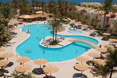 an overhead view of a pool at a resort at Palm Beach Resort Families and Couples only in Hurghada