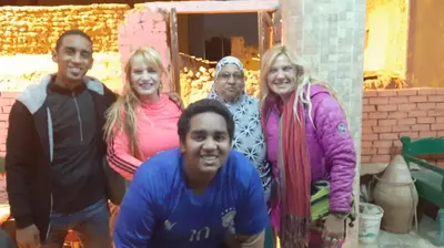 a group of people posing for a picture at Shater Nubian House in Aswan