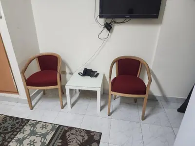 two chairs and a table with a camera on it at Lotus compound in Hurghada