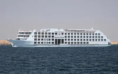 a large cruise ship in the water with at Steigenberger Omar El Khayam Nile Cruise - Every Monday from Aswan for 07 & 04 Nights - Every Friday From Abu Simbel for 03 Nights in Aswan
