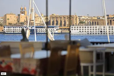 a view of a harbor with boats in the water at Nile Castle in Luxor