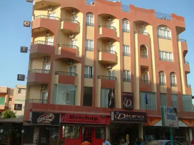 a tall building with balconies on the side of it at Diana Hotel Hurghada in Hurghada
