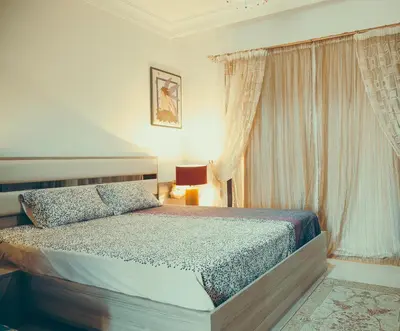 a bedroom with a bed and a window at Studio at Hurghada- NS2 in Hurghada