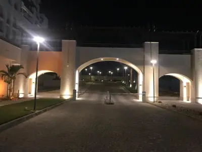an archway in a building at night with lights at Hurghada Furnished Appratment - Al Dau Hights Al Mamsha in Hurghada