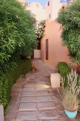 a stone walkway in front of a building at Beit Matta in Hurghada