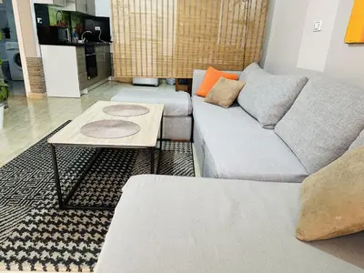 a living room with a couch and a coffee table at Solider Dali in Hurghada
