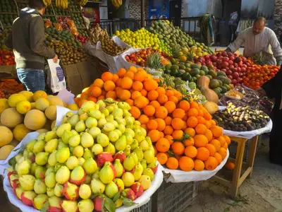 a display of fruits and vegetables in a market at Solider Dali in Hurghada