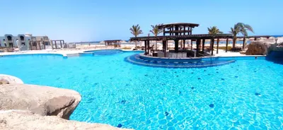 a large swimming pool with a gazebo at Lazuli Hotel, Marsa Alam in Quseir