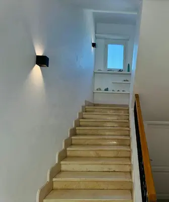 a staircase in a house with a window at Villa with 5 bedrooms & 4 bathrooms - private heated pool in Hurghada