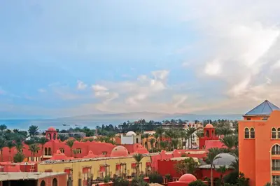 a view of a city with red buildings at The Touristic Promenade Apartment in Hurghada